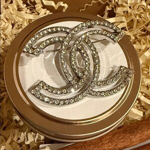 Silver-toned Fashion Jewellery Brooch embellished with rhinestones